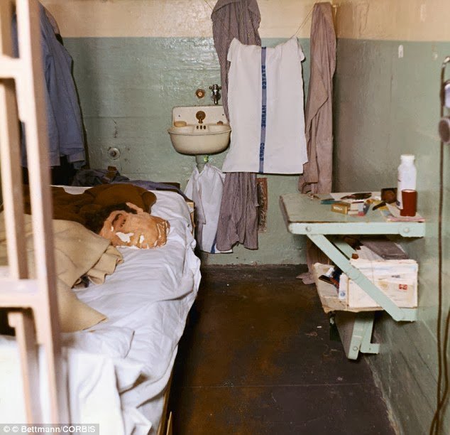 A fake head with real hair sits on a prison bunk, a decoy used by John Anglin during his infamous 1962 Alcatraz escape.